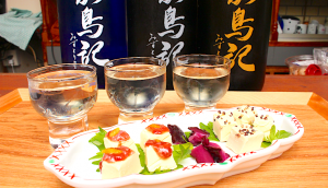 A tasting flight of Miyagi sake paired with a cream cheese plate that leaves you wanting more of both
