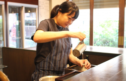 Marie Chiba is pouring sake to tokkuri for serving kanzake